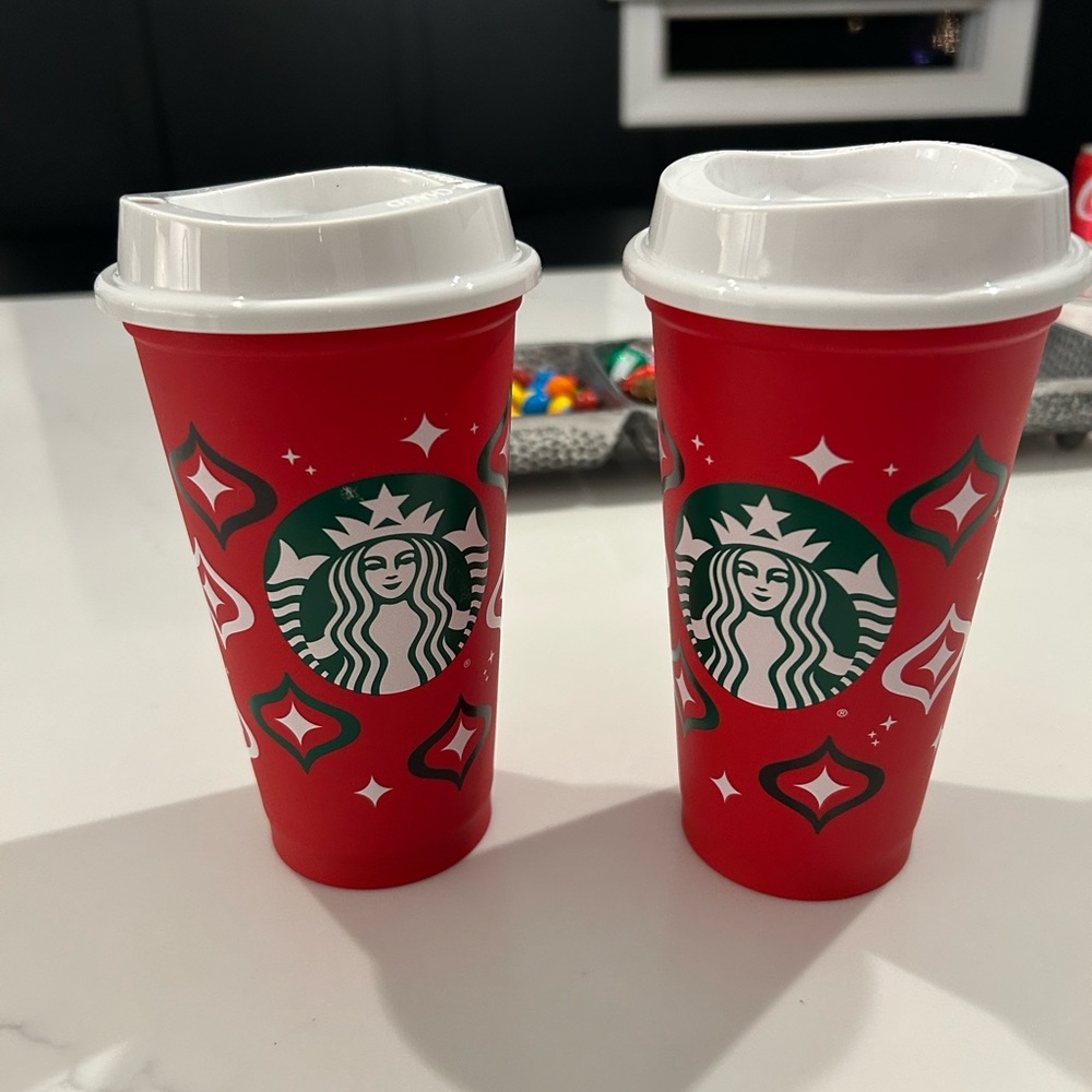 Two plastic Starbucks Xmas tumblers